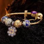 Sterling Silver Fortunate Turns Charms Bracelet Set With Enamel, Featuring Dual Plating in 14K Gold and White Gold
