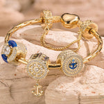 Sterling Silver Captivating Sailing Charms Bracelet Set With Enamel In 14K Gold Plated