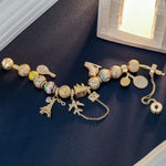 Sterling Silver Sporting Paris Charms Bracelet Set With Enamel In 14K Gold Plated