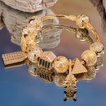 Sterling Silver Golden Paris Charms Bracelet Set In 14K Gold Plated